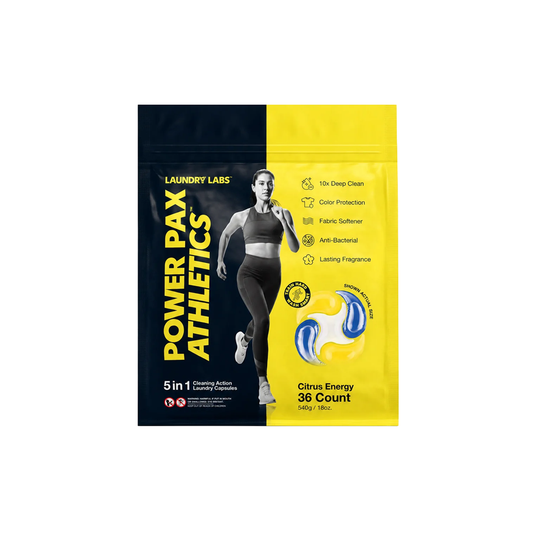 A package of Laundry Labs Power Pax Athletics Citrus Energy 36 count laundry detergent pods, featuring a split black and yellow design with an illustration of a female athlete.